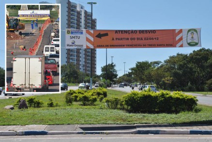 Faixa colocada pela SMTU aponta desvio; no detalhe, obra na regio ao acesso  Ponte Mrio Andreazza.
