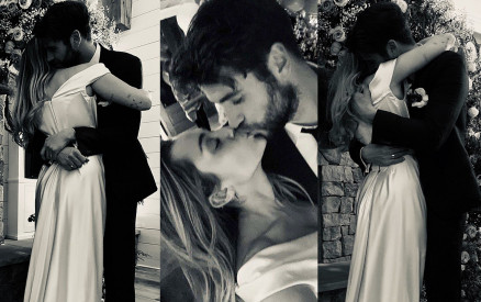  Miley Cyrus com Liam Hemsworth durante a cerimnia