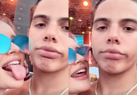 Em vdeos, Julia aparece tentando dar uma lambida no rosto do ator