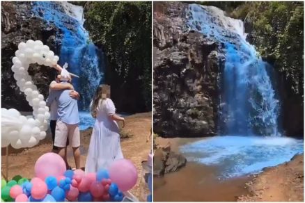 Enquanto famlia se abraa gua de cachoeira  