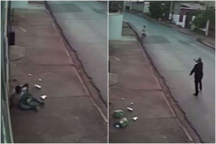 Momento em que o criminoso cai do muro e depois corre do motorista de aplicativo