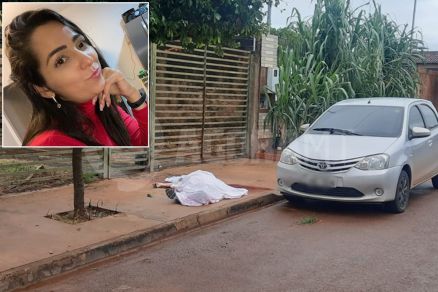 A bancria Leidiane Souza Lima (detalhe) ficou cada na calada aps disparo