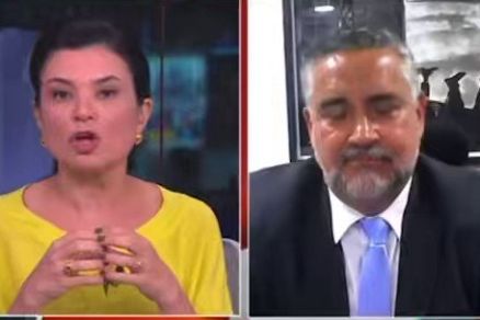 A jornalista Raquel Landim ( esquerda) e o ministro da Comunicao, Paulo Pimenta