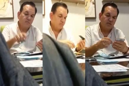 O prefeito de Diamantino Manoel Loureiro Neto contando o dinheiro