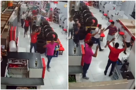 Momento em que ladres rendem funcionrios e clientes da loja