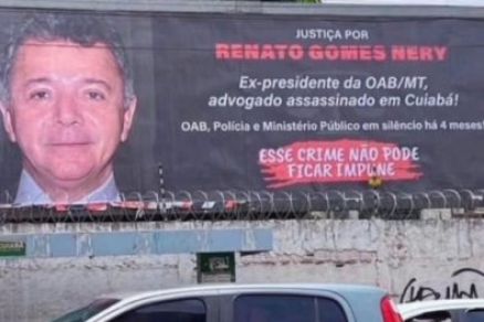 Outdoor em avenida de Cuiab pedindo soluo para o caso