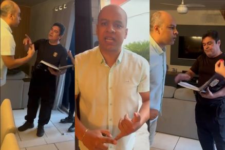 Momento em que os policiais cumprem ordem de priso
