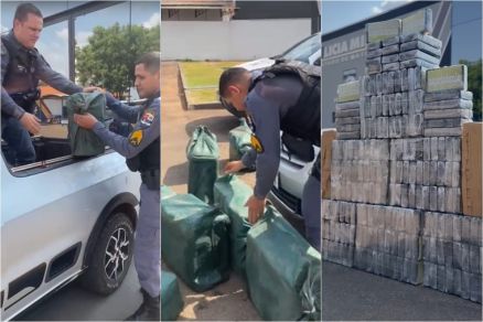Momento em que policiais descarregam droga apreendida 