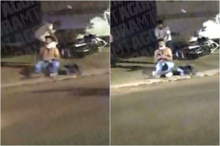 Um popular ajudou o editor Chris Andrei, que est sentado na calada, a estancar o sangramento no pescoo