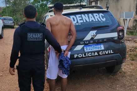 Agente da Polcia Civil durante priso de faccionado 