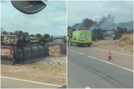 Carreta carregada com pedras ficou tombada s margens da rodovia