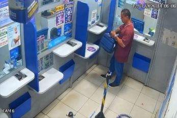 V�deo flagra homem furtando caixa de doa��o em lot�rica de Cuiab�