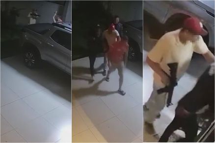 Momento em que v�tima � abordada por trio ao chegar em casa