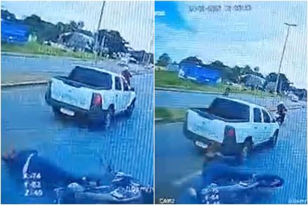Momento em que motociclista foi fechada por picape e caiu no asfalto